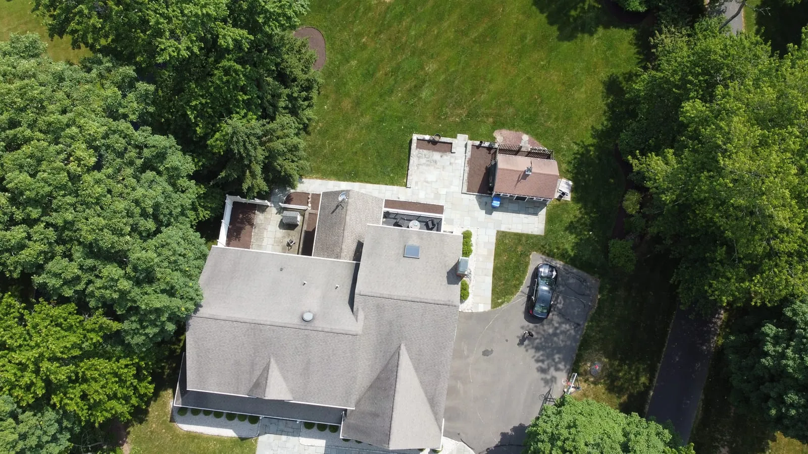 Aerial view of a backyard patio and outdoor living area — MRO Landscaping project, Danbury CT